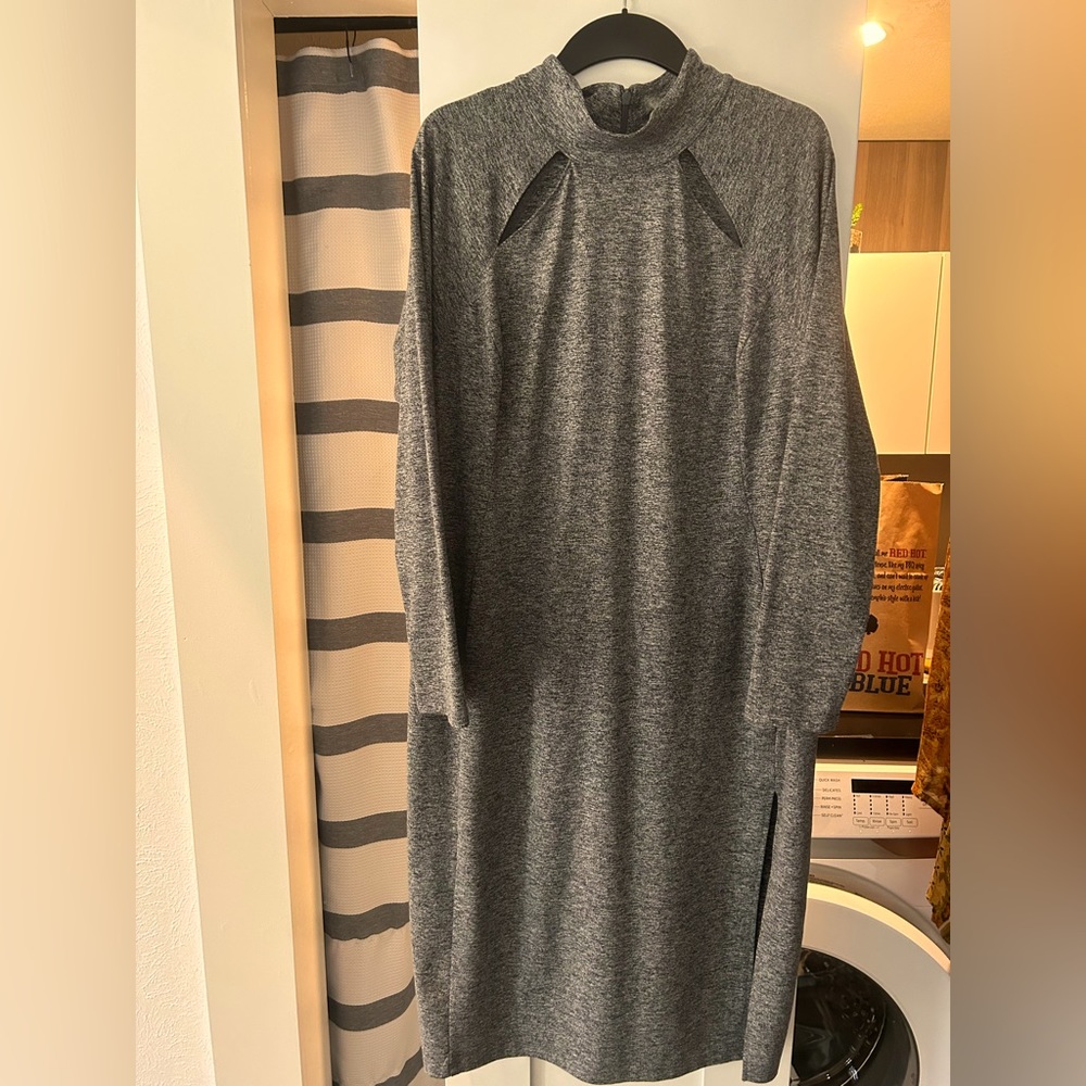 Gray knit  turtle neck, stretch, dress with cutout notches.